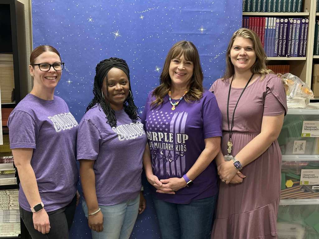 Fourth grade wearing purple