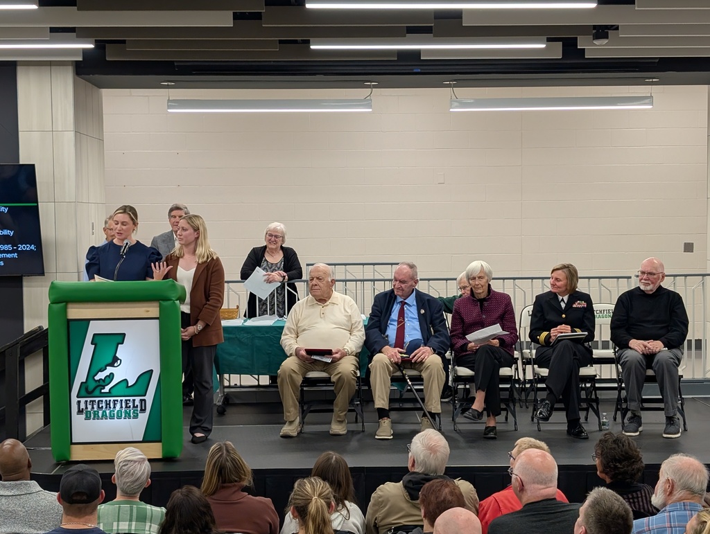 Lynn and Emily Wood accepting for Mark Wood