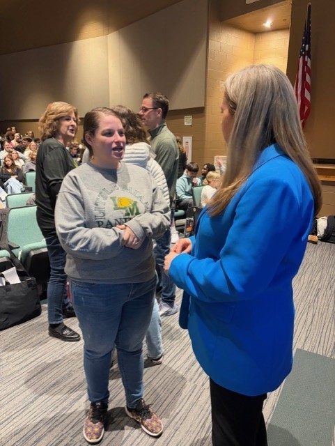 Dr. Erin McGlothlin  with student