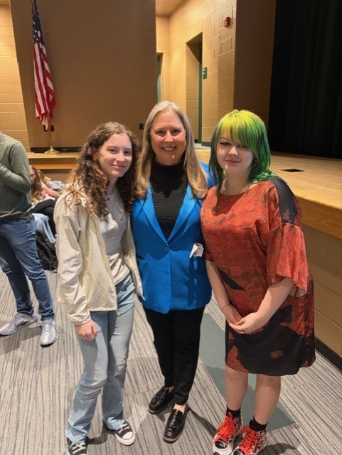 Dr. Erin McGlothlin  with students