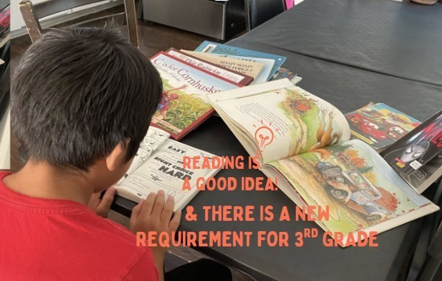 wording that says reding is a good idea and there is a new 3rd grade requirement with photo of boy reading book