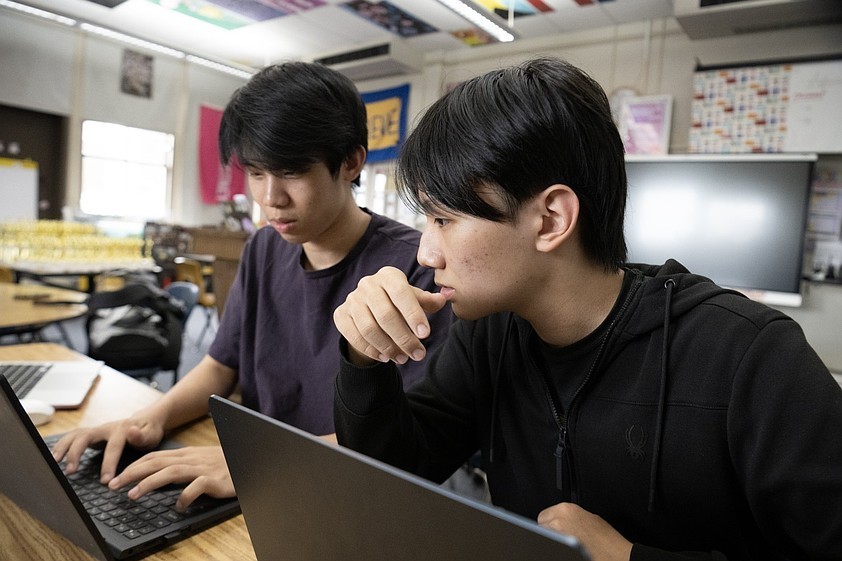 Jack Liu (left) and Shangyu Wu, members of the Little Rock Central High School debate team, prepare at the school on Wednesday, April 1, 2026, for the J.W. Patterson Tournament of Champions, a national high school speech and debate tournament at the University of Kentucky that begins Saturday, April 11. (Arkansas Democrat-Gazette/Adam Vogler)