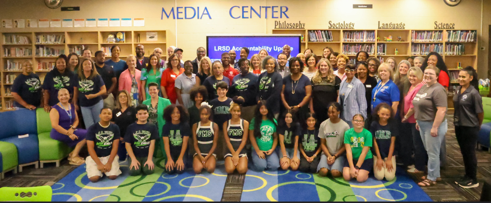group photo featuring students, teachers and principals attending news conference about accountability