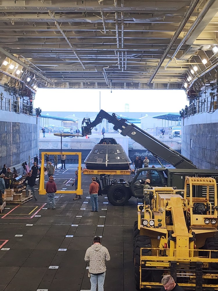 Naval Ship with crew preparing to support Artemis II touchdown