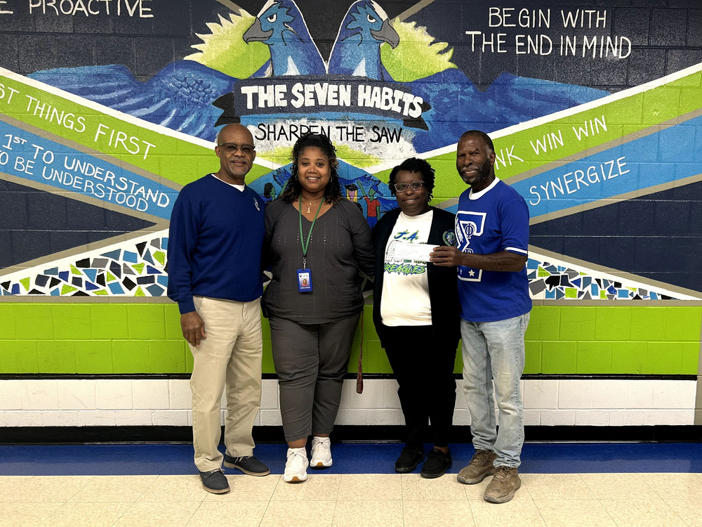 Phi Beta Sigma Members with Andrea Johnson and Melinda Modica, Principal