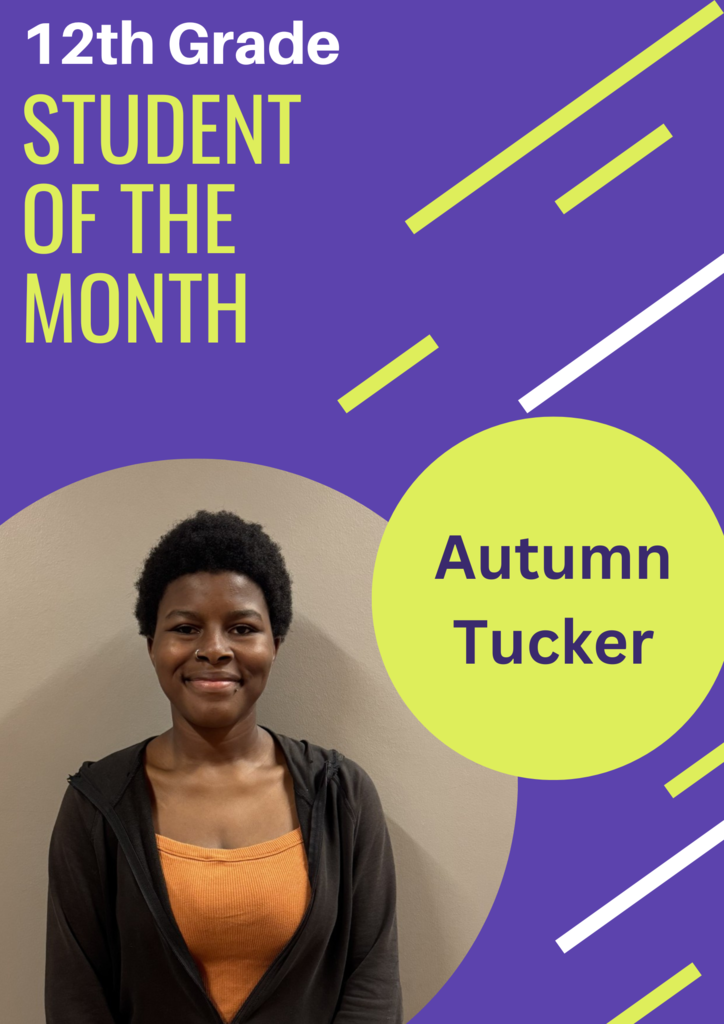 12th grade student of the month Autumn Tucker: short curly hair female wearing orange top with black cardigan