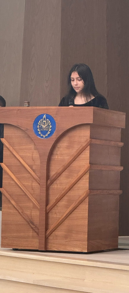 The vice president is giving a speech to the inductees