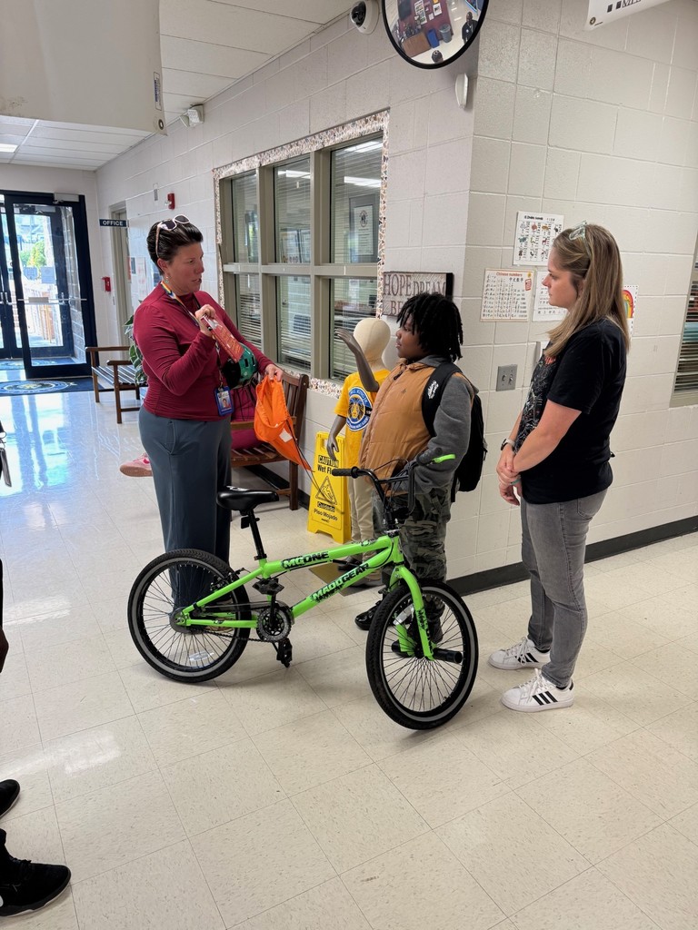 Being presented with his bike!