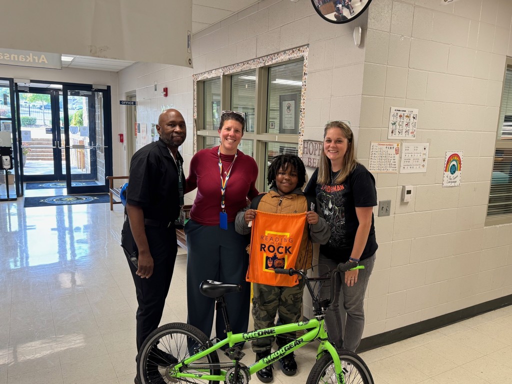 Being presented with his bike!