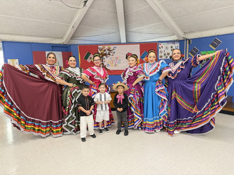 Pre K 4 and the Ballet Folklorico PerLas De Mexico Dancing Ladies.