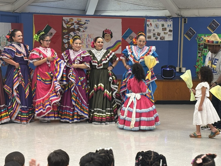 Pre K 4 and the Ballet Folklorico PerLas De Mexico Dancing Ladies.