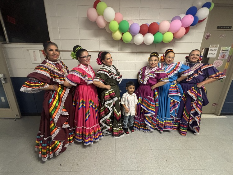 Ms. David’s & Ms. Carruth’s student was so excited to take a picture with the dancing ladies!