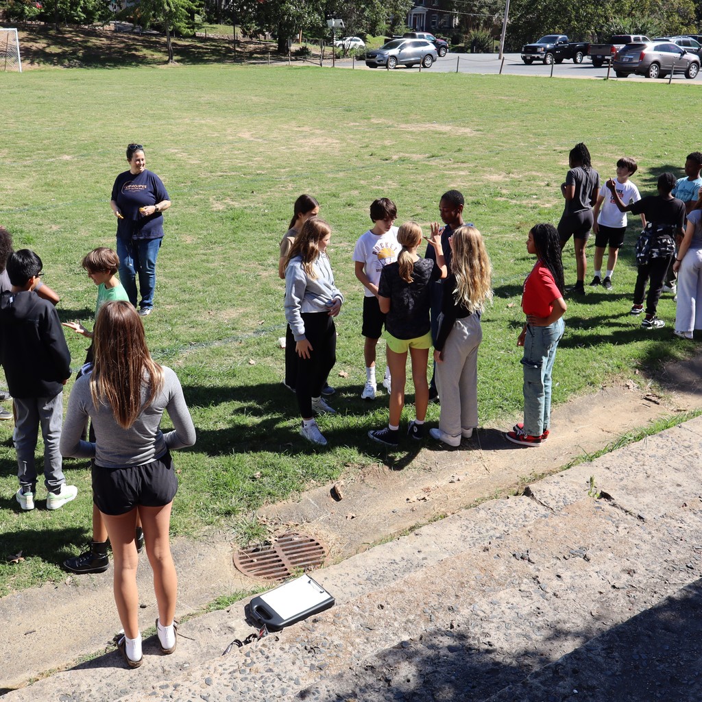 A group of 7th grade students preparing for a Science activity.