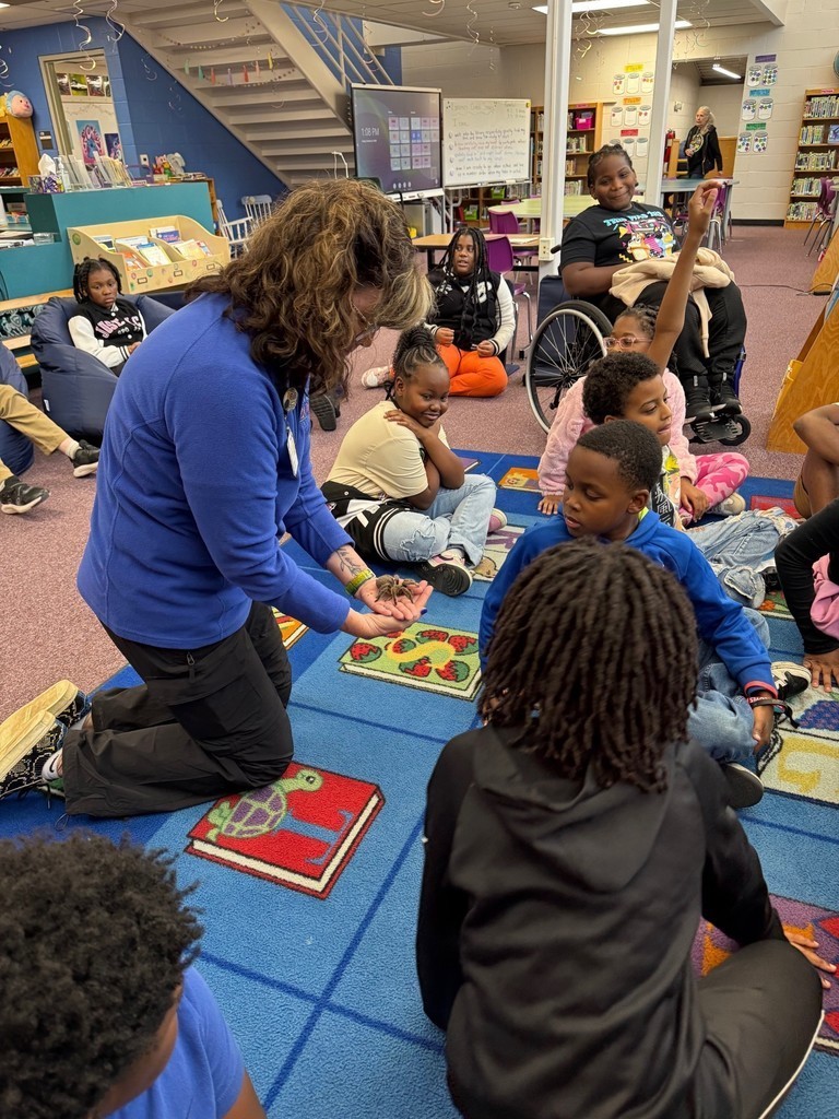 Tarantula being shown to kids