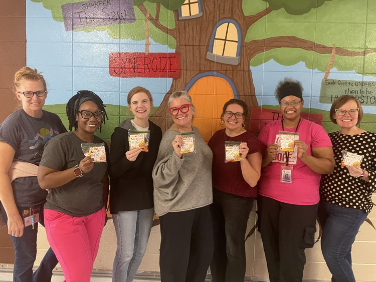 teachers smiling holding their goodie bags 