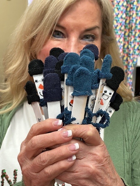 Ms. McDonald with her students' snowmen