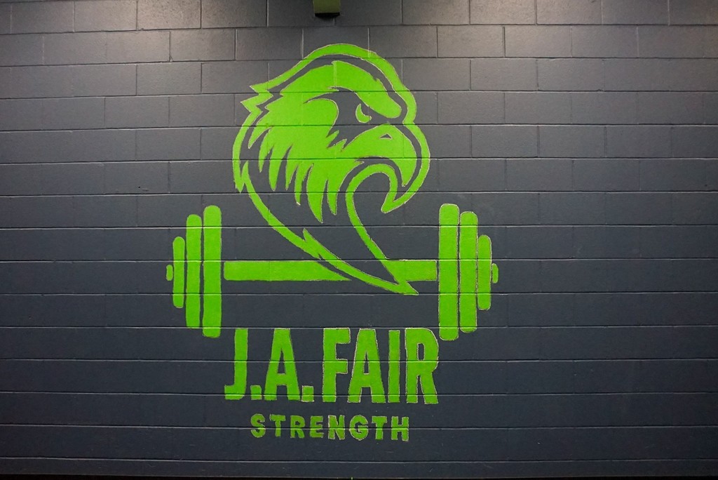 Mural of JA Fair Strength Training of War Eagle logo 