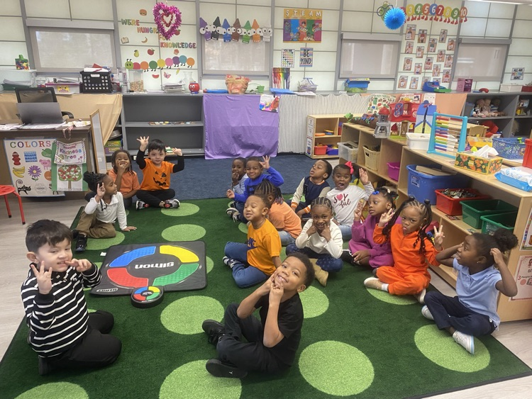 Ms. Slyter’s adorable orange wearing PK3 class!