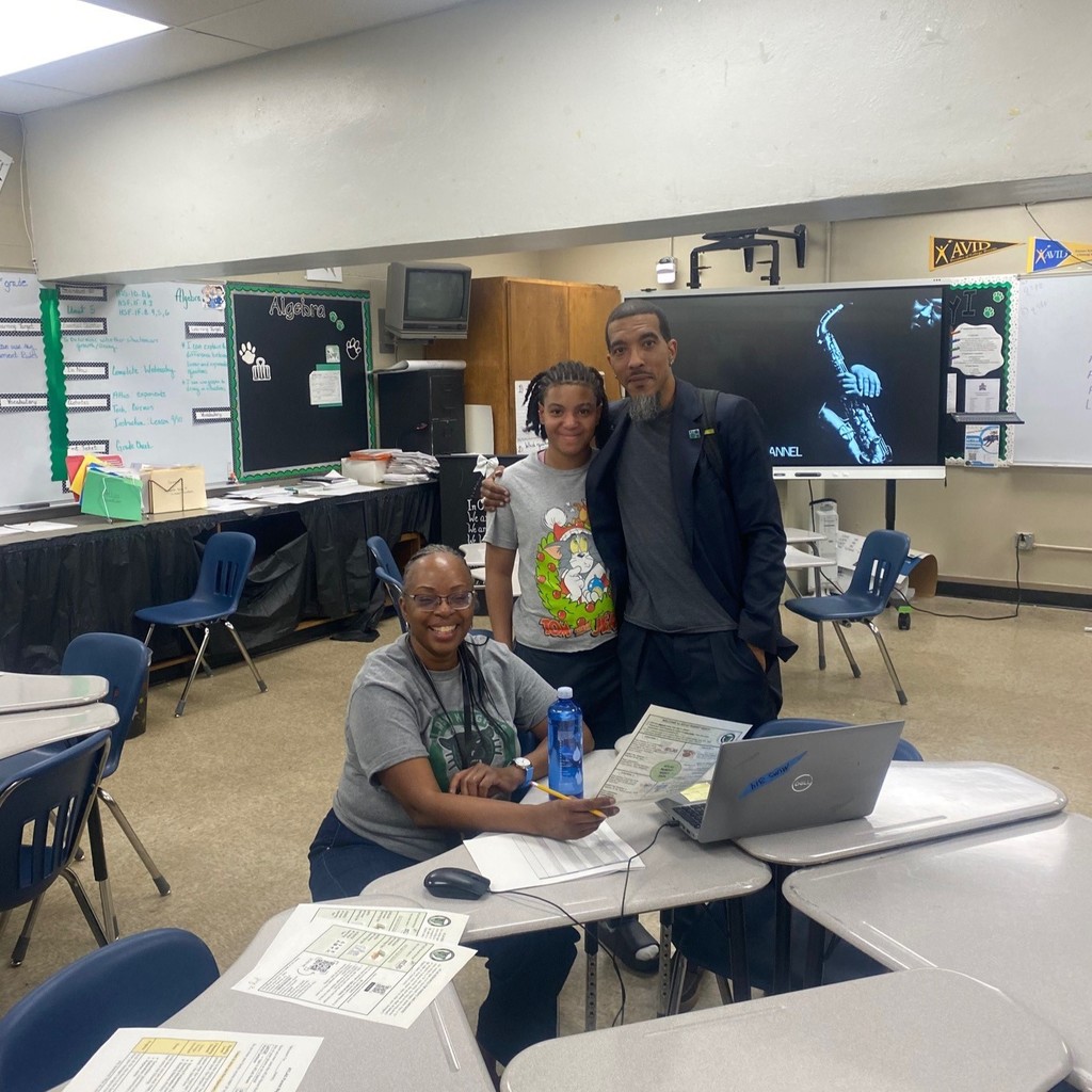 Ms. Mims posing with a PHMS family