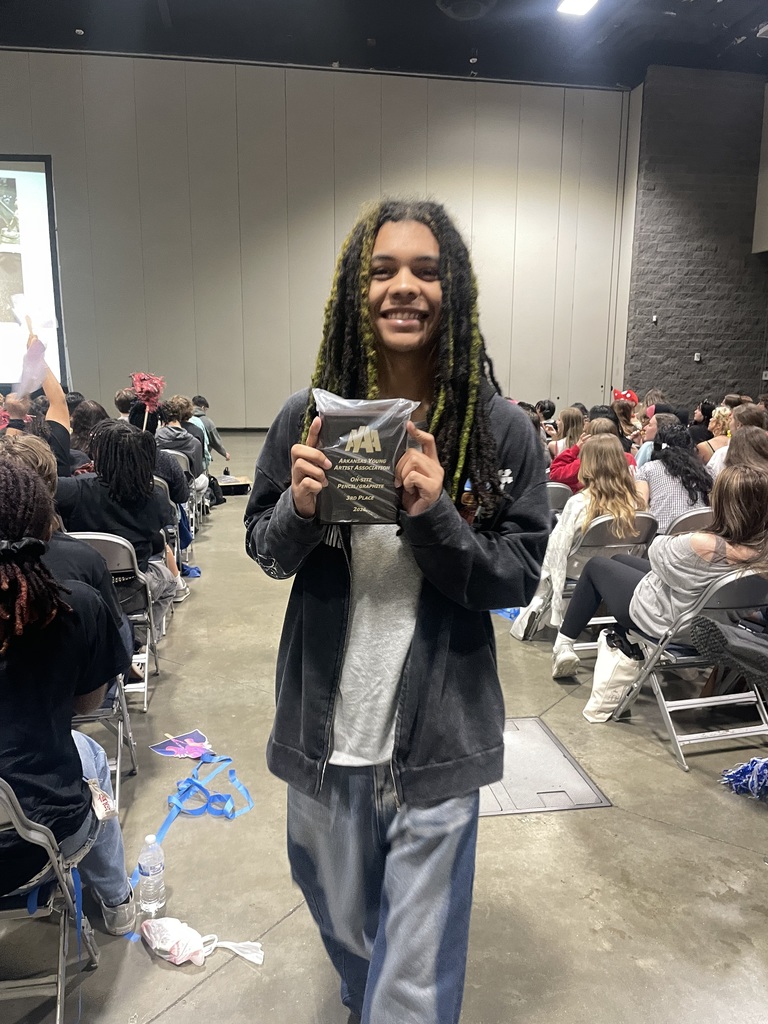 Student receiving an award