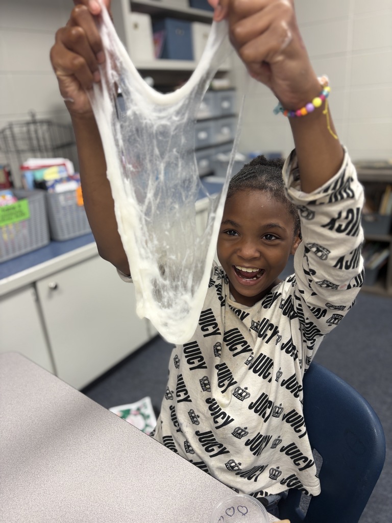 a girl happy she made some great slime