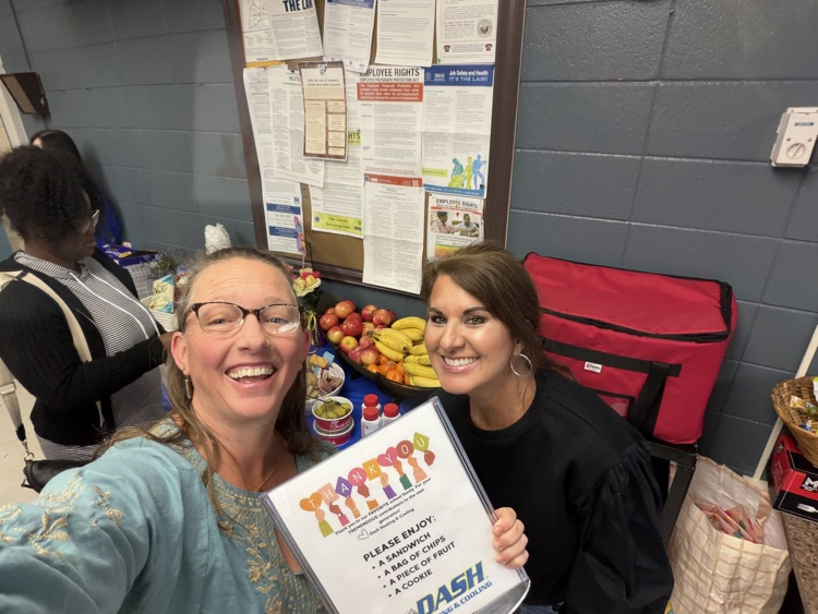 2 teachers happily sharing in the donated lunch from dash heating and cooling