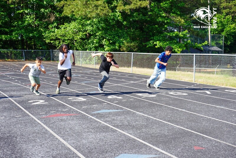 Students racing each other on Field Day 2026