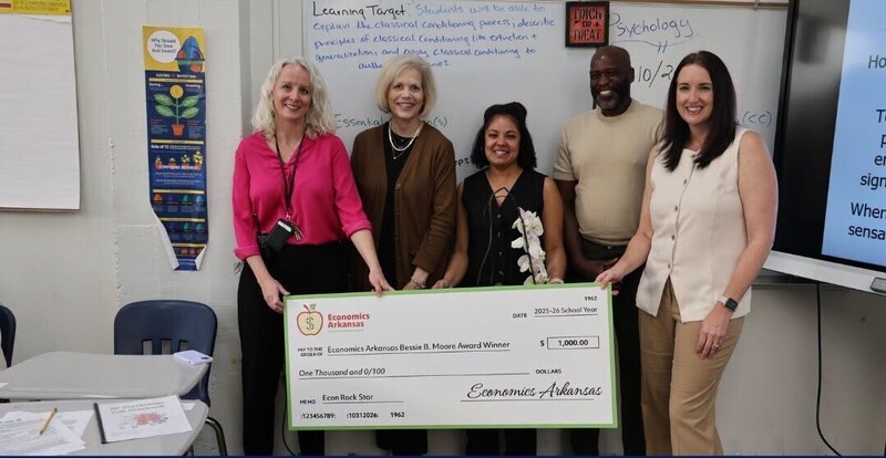 The Economics Arkansas representatives later visited Little Rock Central High School to present Alundra Dickson with the award.