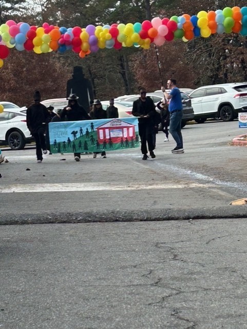 Students marching in Book themed parade.