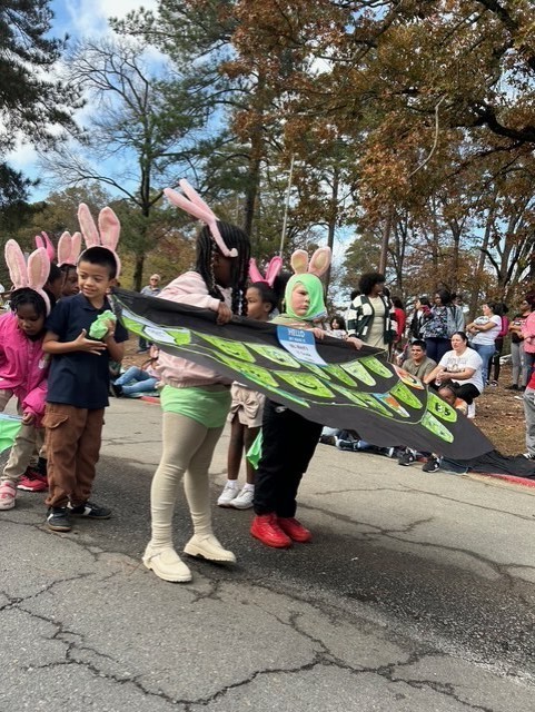 Students marching in Book themed parade.