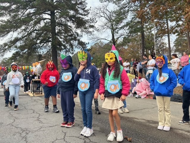 Students marching in Book themed parade.