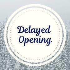 a white circular symbol with the words delayed opening in blue text in the middle.