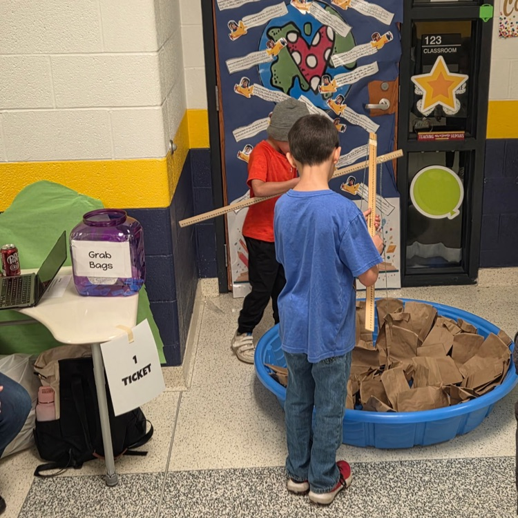 The chicken is cooking, the games and book fair are in full swing! Come get lunch and have some fun. Now until 2pm! 