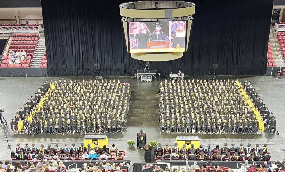 AHS past graduation ceremony showing students in stadium