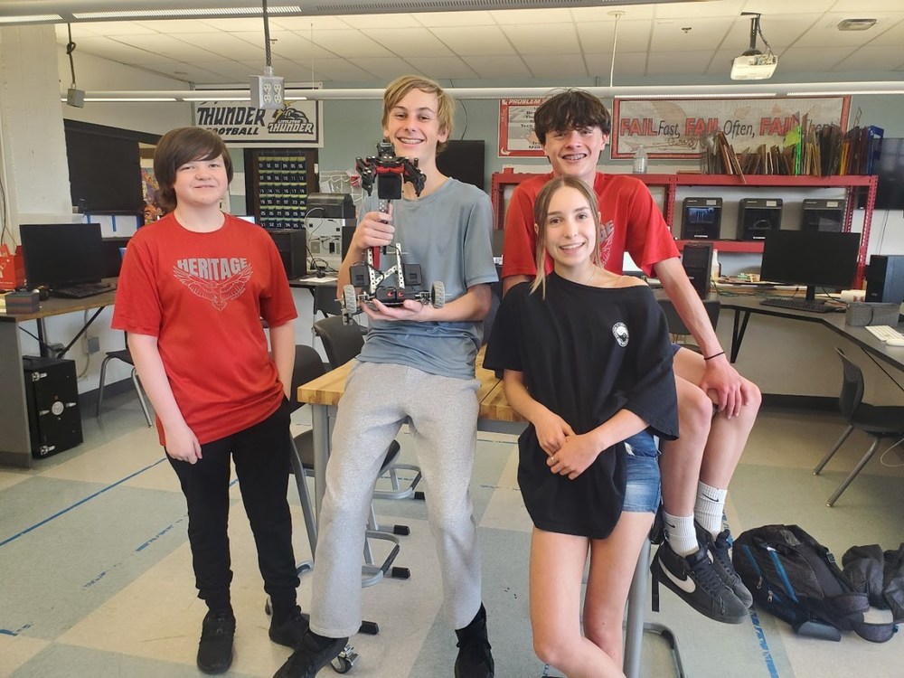 Freshman team with their creation.