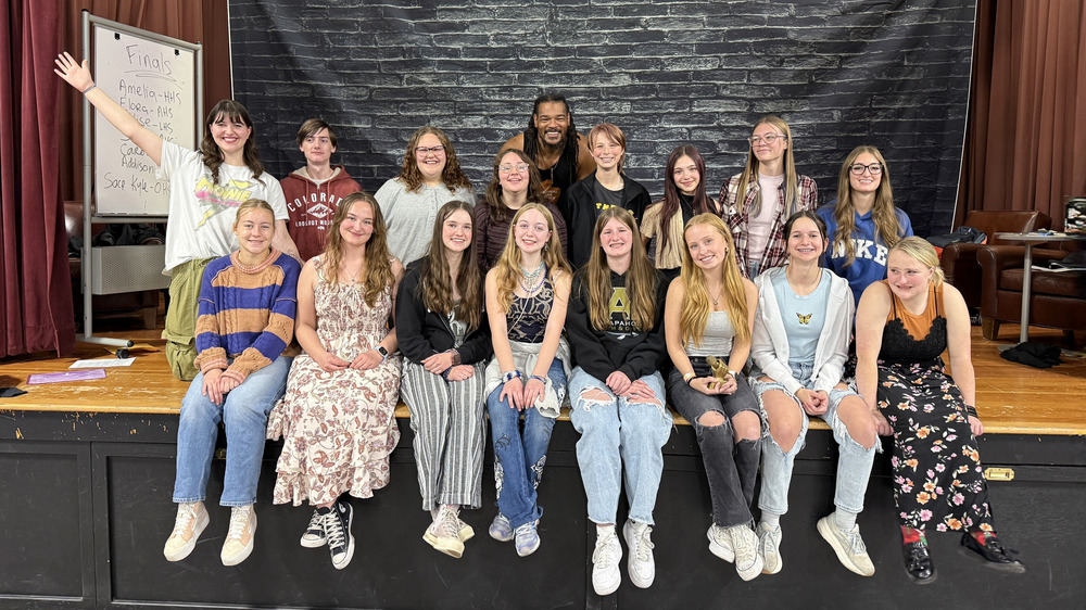 LPS Poetry Slam participants with host Jovan Mays