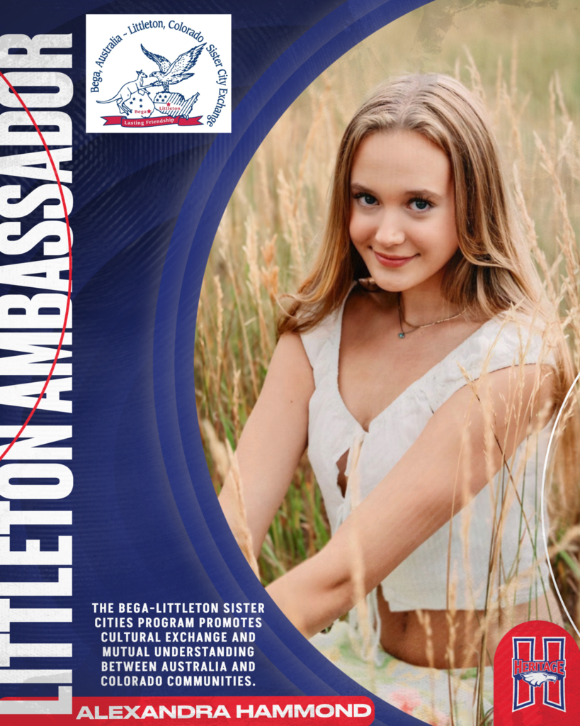 Littleton Ambassador Alexandra Hammond is a smiling blonde girl in a white top, surrounded by tall grass.