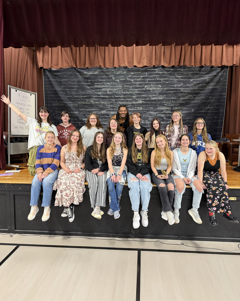 LPS Poetry Slam participants with host Jovan Mays