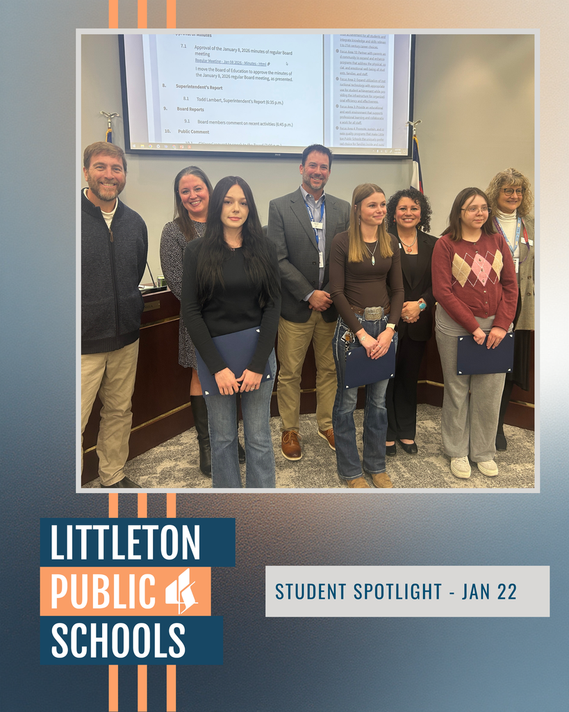 Three students holding award folders stand with LPS officials in front of a board meeting screen for Student Spotlight.