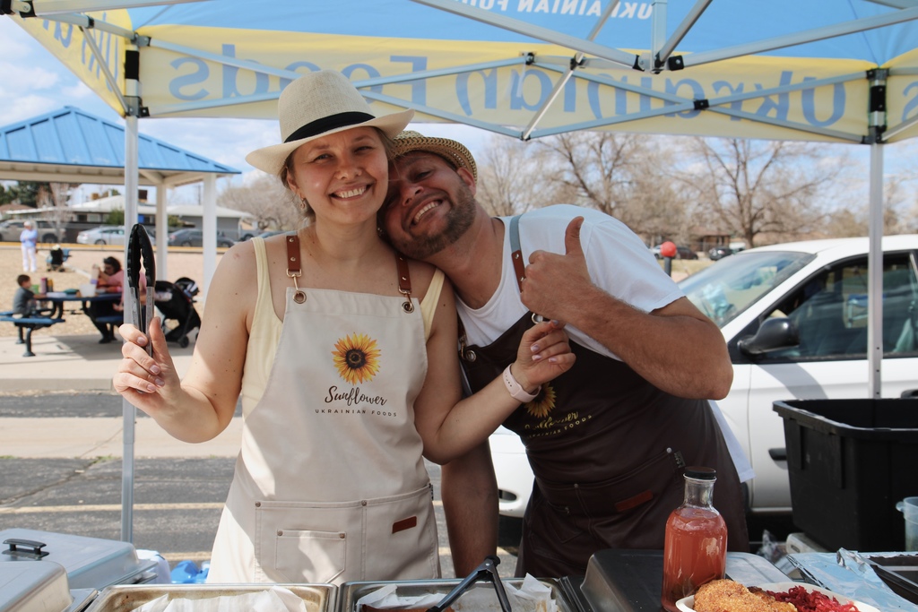 photo of Ukrainian couple working the food stand