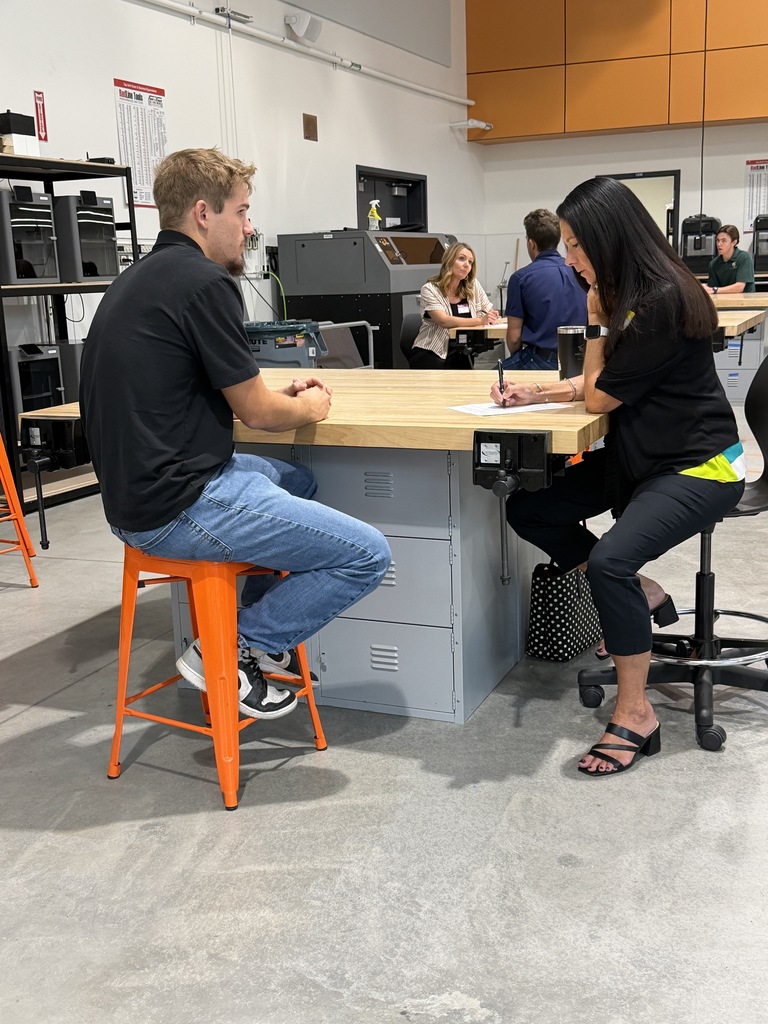 Interview between an adult and a student