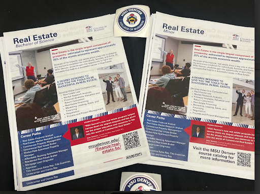  Two printed brochures, one for a Real Estate Bachelor of Science and one for a Real Estate Minor, from the MSU College of Business are displayed, along with two round MSU Denver stickers.