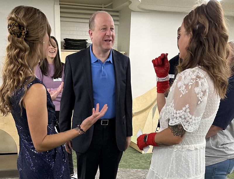 Governor Polis visits with two teachers at The Village for Early Childhood Education