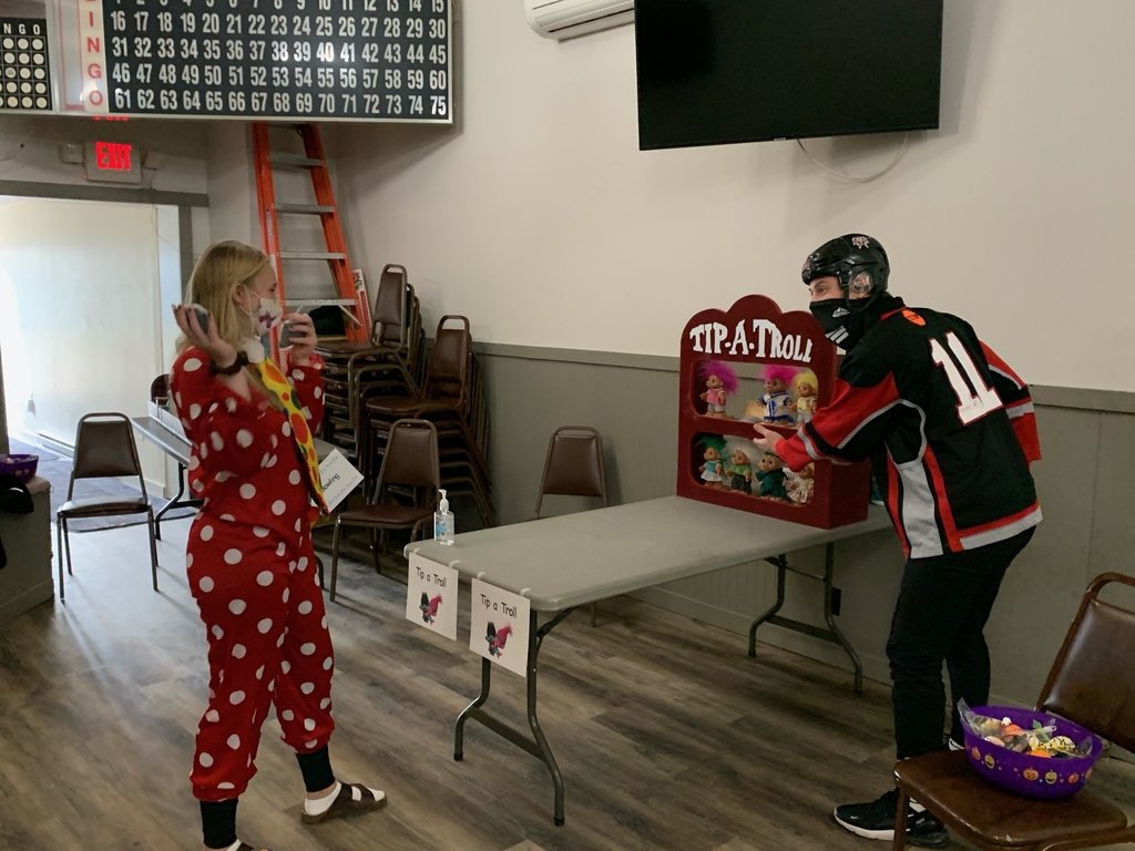 A female and male student playing a game