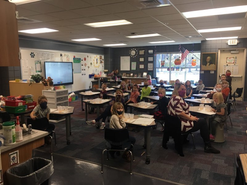 multiple students sitting at desks