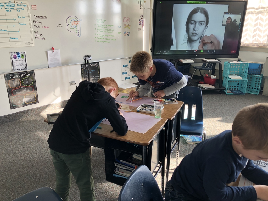 Working hard at art.