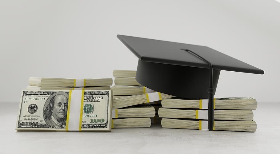 money and graduation hat