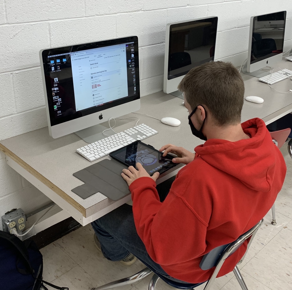 Kid working at computer