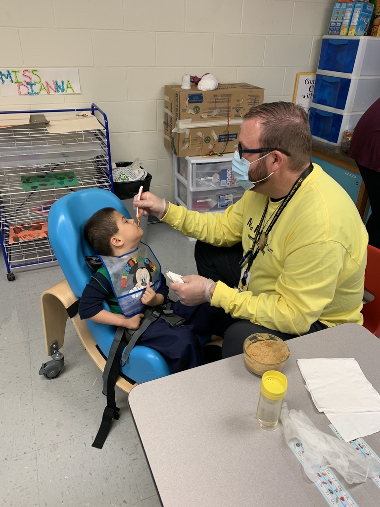 Dr. Poock and a student having snack 