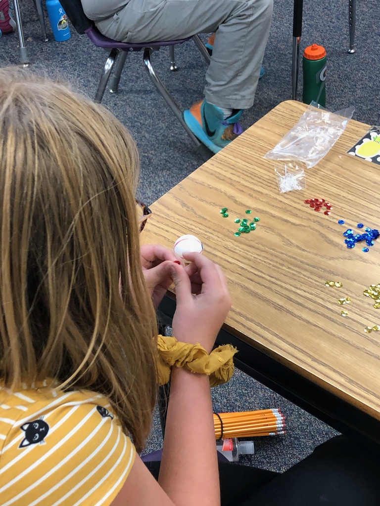 Brady Student Creating a Christmas Ornament